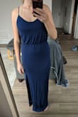 This is a great maxi, it's fairly flattering although does show some buldges around the middle. I love that the top/waist is actually a bit billowy - sometimes that style ends up laying flat but this has a great shape.
I'm 5'9" and it just skims the ground. - Leah M.