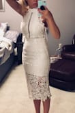 I bought a bunch of white dresses for my bridal showers and thought this one would have been my favorite actually. I initially ordered the small (I feel like most Lulus brands run really small), but it was way too loose up top (I'm a 32 DD). I ordered the xs which fit much better, but was still a weird fit on top (almost like it would fit better on someone much taller with a taller torso). If I had kept it I would have altered the neck and had the snaps tighter. Overall, it was beautiful, just didn't work for my body type. - Lauren K.