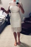 Love this dress.  I ordered several white dresses for bridal showers and this was the one I thought I'd like the least, but was my favorite.  It is so cute and I have really big boobs and it had actual support somehow (because of how tight it is) so I don't even have to wear a bra. I initially bought a small but it was too big up top so I ordered an xs.  Super cute and I highly recommend! - Lauren K.