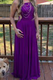 I usually wear a medium but a small fit me great! I wore 3-4 inch heels and this dress was still a tad too long. I included two pictures to show the color. Looks more purple in natural light and more magenta/pinkish in indoor lighting. - Kayla I.