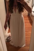 I bought this as a potential wedding dress for my elopement. The dress was beautiful and could lean toward boho, which is what I wanted. But the bust wasn't right for me. Specifically because I have nothing to fill it in! And I didn't love it enough to have it altered. Still giving it 5 stars though for being a good quality dress with a unique neckline. - KRISTIN L.