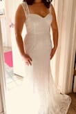 I love this dress!!!! It fits perfectly! The fabric and quality is amazing. The lace is darling and my butt looks great in it. This will be my wedding dress next year. I honestly think I just need to hem it. Question is do I leave it long for a train or even all around? Regardless I'm so excited to wear this on my big day!!! - Nadia G.