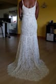 I tried this dress on for my destination wedding. It is a beautiful dress, especially the lace train in the back. Ended up returning it because the color wasn't exactly what we wanted, but would highly recommend - Renata J.