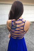 I'm a sucker for dresses with fancy backs. The downside is you can't wear a bra with it. It's pretty tricky getting the dress on and off because you have to loosen/tighten the straps but it's worth it! - Emily A.
