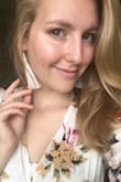 These are gorgeous on, go with everything, and are super light weight and won't weigh down your ears. I often don't wear earrings, and so while I love some dangling pairs, they can take a toll after a day of wear when they are heavy. These are just fringe so they're super comfortable to wear. These are perfect for the summer, and give a low key but dressy look to any outfit. I always get comments every time I wear them. Would recommend. - Viivianne M.