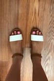 I was pleasantly surprised with these sandals. At first, I was worried about the strap across the toes being too tight and potentially rubbing blisters, but it wasn't tight at all - they were comfortable & fit me perfectly. Lulus has never failed me! :) - Alison P.