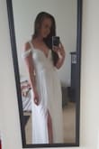 I fell in love with this dress online after a friend of mine told me about their affordable wedding dress selection. I was a little hesitant and nervous about what the quality would be but this dress blew me away. The quality is amazing and comparable to the dresses my best friend tried on in high-end bridal shops. The fit is flattering and I feel like a princess wearing it. I'll be using this as my wedding dress for sure. :) - Macy E.