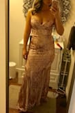 My pictures do not do this dress justice because I gained a bit of weight before wearing it. It is a very heavy amazing quality dress. I received SO many compliments on it. Worn as a bridesmaid dress. Wonderful fit and details. - Christine