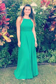 I own this dress in two colors. The green and burgundy. I bought the green years ago and the burgundy this year. It has changed...for the better. Now the little part in back with the zipper has a little elastic in it for easy fit without squeezing out your back fat! Before that was my only complaint is that it was a tiny bit tight in the waist. - Christine