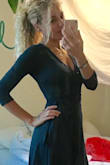 F-ing love it! The material is soft and very comfortable. The color is amazing, great office dress! Not too short either, just the right length! - Lore Y.