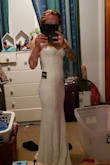 Very impressed with the customer service and the dress itself is stunning. Wanted a simple but fitted dress for my wedding and could not be happier. The quality is great as well. The original dress I had ordered was sent to a wrong address and sent back. - Margaret G.