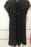 Cute dress but not so cheesy look. I like the skirt hem gives a bit of frill. Material is rather thick but cooling. Good for summer season. Had to button in front though as it is too open for me. Strawberry prints are also cute. - Susanna C.