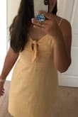 This is such a cute dress. I'm normally in between a medium and large in Lulu's dress sizes, and I decided to size up to a large, and it fits perfectly. This dress is so nice for summer, and I get tons of compliments on it whenever I wear it! I definitely recommend. - Mary T.