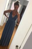 Cute dress, fits pretty true to size but is too long. I don't want to pay to have it shortened so I'll wear heels. Quick arrival, good customer service, am wearing as a bridesmaid dress. Small issues with the zipper at the back and it's more expensive than I thought it would be (exchange rate and duty fees to Canada add up!) but overall happy! - Amelia P.