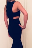 The fit is tailored almost a mermaid style. The fabric is stretchy and extremely comfortable. There is a lining in this dress and a long zipper down the center of the back.
I wore adhesive bra cups, and black strappy heals. This dress is a steal for the price. Easily could have been sold for triple at the mall.
If you are looking for something that is classy, elegant, with a touch of flare stop here. I received many compliments throughout the night and requests of where I bought it. Love, Love, Love - LAURA D.