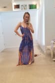 I order from lulus all the time and standardly always order a small. I never size down but on this dress I would recommend it. I did keep the small and I just wear it with a belt because I didnt want to wait to exchange a size.
Otherwise the fabric is super light weight and the colors are beautiful. Love the low back. The bottom is a litter sheer and the slip part underneath is a bit sheer so it blends well. I've worn it once and gotten tons of compliments already! - Jennifer V.