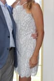 The dress was beautiful and I received many compliments!  Nice material and well made dress but I ordered up a size based on reviews and should have ordered the medium because the large kept slipping below my bra in the back. - Kathie C.