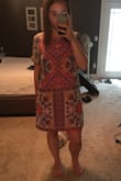 I love this dress! It is flattering and light weight - perfect for summer. I am typically a medium, but sized down and got this in a small. The medium was way too big and fit me like a garbage bag. The small is a little snug in my shoulders, but not uncomfortable. I am short (5'0") and the length works well for me, but I could see this being a bit short for taller people! - Amber P.