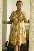 I think the dress is beautiful, it is flattering and the colors and pattern are vivid. I chose a size small, but my arm movement is a little restricted, every thing else fits well. I would not change it because a medium would be too big on me and I can wear the dress the way it is. Otherwise I really love it and can't wait to wear it. I highly recommend - Janet R.
