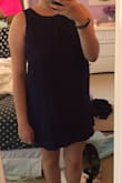 The material is way nicer than I thought! Overall the dress looks exactly how I thought it would. Slightly tight but not enough to go up a size. It can be dressed up or down! Can't wait to wear it out! As you can tell by the pic, it's not as flowy in person but that maybe bc the model is smaller than me. - Marley S.