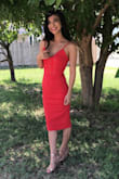 This LRD was perfect for a summer wedding. The material was thick enough that shape-wear wasn't needed, which meant I stayed comfy and cool. I was anxious about the fit, as I am petite, but the length was perfect and helped balance out the bodycon fit and low neckline/cleavage. I received a ton of compliments and would love this in other colors! - Desarae A.