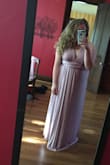 After reading reviews I ordered a size XL, but would have been fine in a large. I wore this as a bridesmaid dress and it was fantastic! The fabric has a nice, subtle shimmer and doesn't wrinkle easily. It is no problem to achieve a flattering look since you are able to wrap it various ways. Contrary to many reviews I've read, the fabric isn't THAT heavy. I wore it last weekend- a very warm and muggy day- and felt it kept me cooler than the other girls. It wasn't clingy around my middle, which was what I was hoping for! - Tabitha R.
