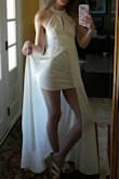 I ordered an XS and a S. One Package had an XS and S sticker on it, but both tags on the dresses said S. I tried both dresses on. The first one fit perfectly. The other one was not sewn very well. The seams were crooked and the lace in the back did not lay down flat. 

Overall, I am happy I ordered two dresses and am happy one of them fits. I will be wearing this after I get married in Vegas and am super excited to wear it! - Alexis L.