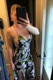 I was stalking this jumpsuit on Lulus for months and finally saw the price dropped so I purchased. Planning on taking it to Hawaii for an upcoming vacation. I love the fabric and color. I wear size Medium in everything but would have gotten a large if I could go back. It's a little snug on my waist, and I don't think my chest is cut out for the jumpsuit either (34D), I was falling out so again, would have sized up if possible. Otherwise, it's a win! - Brittney B.