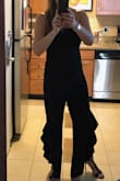 Love this jumpsuit, very comfortable and stretchy material. Wore this to a wedding and loved how the ruffled legs moved when I danced. - Denise S.