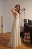 Great dress, I did get it altered to make it fit perfectly (runs a bit large in waist and very long). Super flattering and not too tight around the belly. If you aren't short like me, the torso should fit perfectly! 

Can't wait to wear this again for our wedding reception in august. - Ally L.