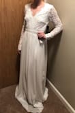 I really had high hopes for this dress for my casual outdoor wedding. The back is gorgeous, and the length is perfect, but the lace feels cheap and it has very little give (which also means it ended up looking loose on my arms). Plus, for those not blessed in the busy it is really not flattering, you would definitely need some sort of adhesive bra. For $86 it's not bad, but if you're looking for a budget wedding dress look elsewhere. Much better for bridesmaids, a prom/dance, etc. - Nicole G.