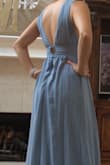 I ordered all the dresses available in slate blue because I am a bridesmaid in my sister's wedding. Literally every one of them for in an extra small except for this one. I could get it zipped. Ultimately I loved the way it looked and ended up ordering the small....overall very flattering on many body types. - Stephanie M.
