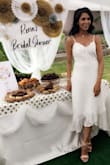 I absolutely loved this dress. I wore it for my bridal shower. It was the perfect bridal white. The quality was wonderful, the lace felt great. All my guests loved my dress, and thought it looked perfect for the occasion. It is the type of dress that can be worn for numerous occasions, because it's very classy and at the same time a little boho! - Rena S.
