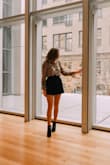 Works better with high waisted jeans/skirts if you don't want belly button to show. Looks really good and makes an outfit look put together. Personally liked styling it tucked in. Loved it!!! Always makes simple look classier. - Yelena T.