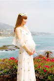 I bought this dress mainly for my maternity photo shoot. Had to check the size chart to make sure my 9 months pregnant belly can fit into it. I ended up getting the medium. Once the dress arrived, it's way better than I thought. Great material with thick lining, can be wore as both dressy and casual. I had to do some minor alterations but it was expected. Overall I'm so happy with my purchase, and can't wait to buy more beautiful clothes from Lulus. - Chen C.