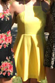 I loved the dress. The material was really nice and comfortable. It looked very nice on and I loved wearing it. Was a very good length. If you are borderline on sizes definitely order up. - Adrienne H.