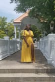 This dress is so beautiful! I received so many compliments on it and it fit perfectly. I have a lot of breast and it covered them well. It totally worked for the wedding that I went to. At times I had to re-tighten the knot for where it was tied, but other than that the dress was perfect. - Shaunette A.