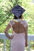 I wore this to my graduation and I absolutely loved the way it fit and how it looked on. Absolutely adorable, I got a lot of compliments on it and it fit really true to size. I ordered extra small and it fit my body really well. The only thing that looks a little different than how it's shown on the model is the length, but I'm not very tall so that's normal for me. - Emilie N.