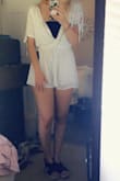 I love this romper. The only reason it's too short on me is because I'm tall but subsequently my torso is also really tall, so it's already hard for me to fit into rompers and one piece swimsuits. If you're tall and worried about your butt hanging out, then probably don't purchase this. The top portion is also huge but that's okay with me because I'm pairing it with a bandeau. Overall really adorable! - Vivian F.