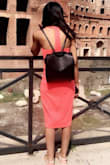 This dress will make guys eyes get big and ladies heads turn. - AREONA E.