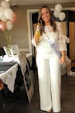 I wore this shirt over a white sleeveless jumpsuit (also from Lulus) for my bridal shower. It was absolutely perfect and I received so many compliments. It comes with a little white crop tank top to wear underneath so I can't wait to re-purpose the shirt for my bachelorette party and honeymoon! - Casey G.