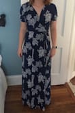 I loved wearing this dress! It felt great on and I got a lot of compliments. It does run very long. I ordered an XS, wore 5 inch wedges, and it was perfectly floor length. Even with the dress tied as tightly as possible, I had to use body tape on the chest area too keep it from falling open over my bra because I have a small chest. The tape held up well and you totally couldn't tell, it looked great all night. - Joeline K.