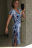 The color is gorgeous, the dress is flattering! It's a very comfy material and washes up nicely! The slit  is high on the side, but it makes it very sexy! - Lisa L.