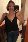Really nice, slinky, sexy material! Normally I'd buy a medium but the small is perfect. Love this shirt! (I did buy the little petals to use with it instead of wearing a bra.) - Lisa L.