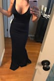Great quality! Very flattering dress, it's stretchy which I love. It is a little low on me so I'm not sure how I feel about that, I might return it just because of the cut, but I think it's a great dress. - Alex G.