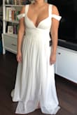 Going to use this dress for my engagement photos. The quality is amazing and very flattering in all the right places because of the fabric and dress design. The bust area is a little revealing, something to keep in mind if your bust is larger. I will have to get the length hemmed and the straps tightened about an inch, but I'm short so that was to be expected. Definitely worth the price! - Angela G.