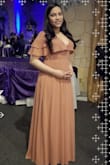 This dress is beautiful, very long (be aware of that) great quality, but a little bit sexy on the top. If you don't mind that it just gorgeous!!! I was 11 weeks pregnant at this time, still fits flowy. - Jade