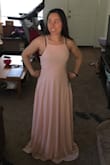 The front of the dress is a little plain but the back is so cute!! The straps were a little tight but once I had someone adjust them the fit was just right. - Lisa M.