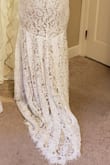 Bought this for my destination wedding. It is lightweight, beautifully made, the train is stunning, and has a boho feel to it. Thank you for a perfect dress at a perfect price. - Kimberly C.