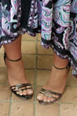 I am normally just making it size-wise with a 6 as long as there is no back to it as having an open heal strap gives me that extra smidge of room I need. Since these had a back to them, I had to get a 6.5 as I have tried similar ones from LuLus and they were too tight in a 6.  They are a tad loose but I am clearly right between sizes so I made it work. They are beautiful and totally worth it at the sale price.  All high heels are uncomfortable unless they cost a fortune.  These are tolerable. Could almost go the entire day without changing to flip flops. This is my favorite store! - Kristin F.